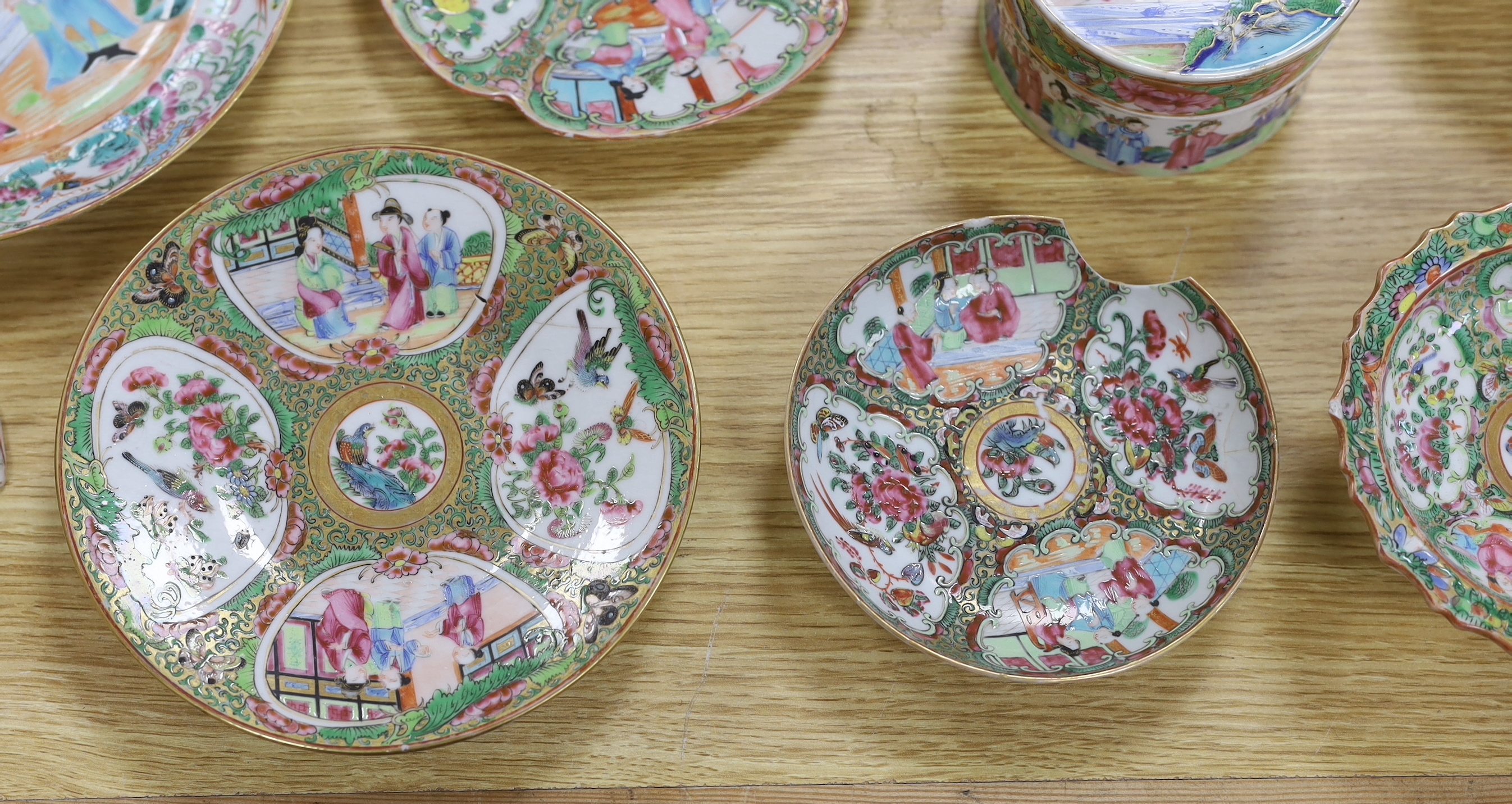 A quantity of 19th century Chinese famille rose dishes, plates, teapots and vases, tallest 21.5cm